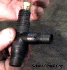 Brass reducer on T fitting