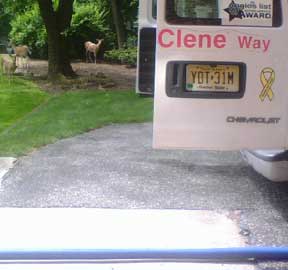 Deer next to Bane-Clene truckmount carpet cleaning machine